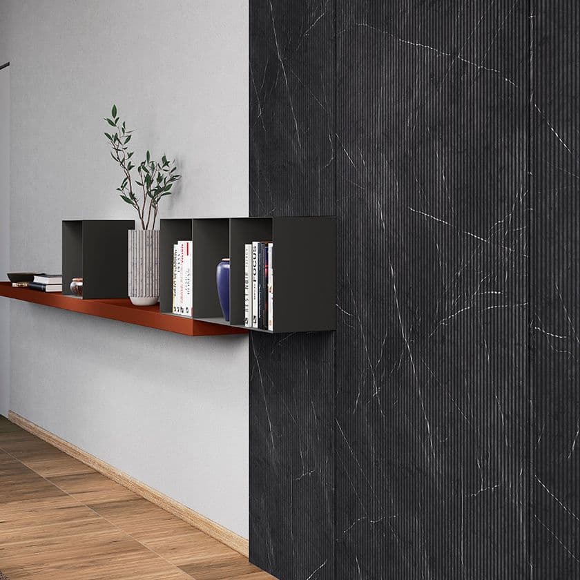 The Phoenix table has an extensible Dark Brass frame and Walnut veneered top