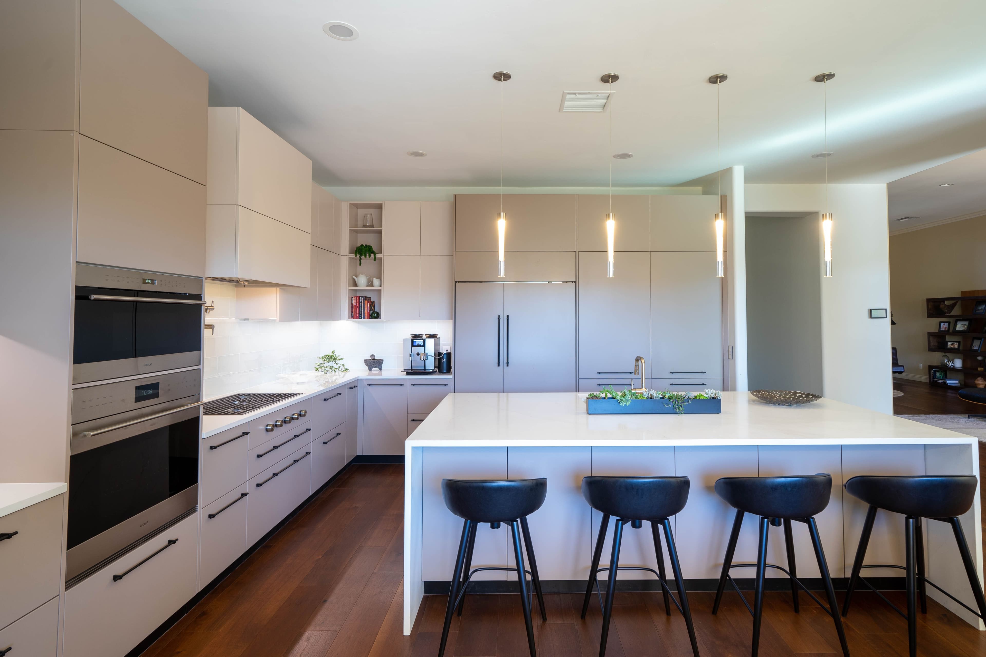 Modern Stuffco kitchen with a spacious island, sleek cabinetry, and integrated appliances, designed by Febal Casa to highlight expert kitchen design and home remodeling.